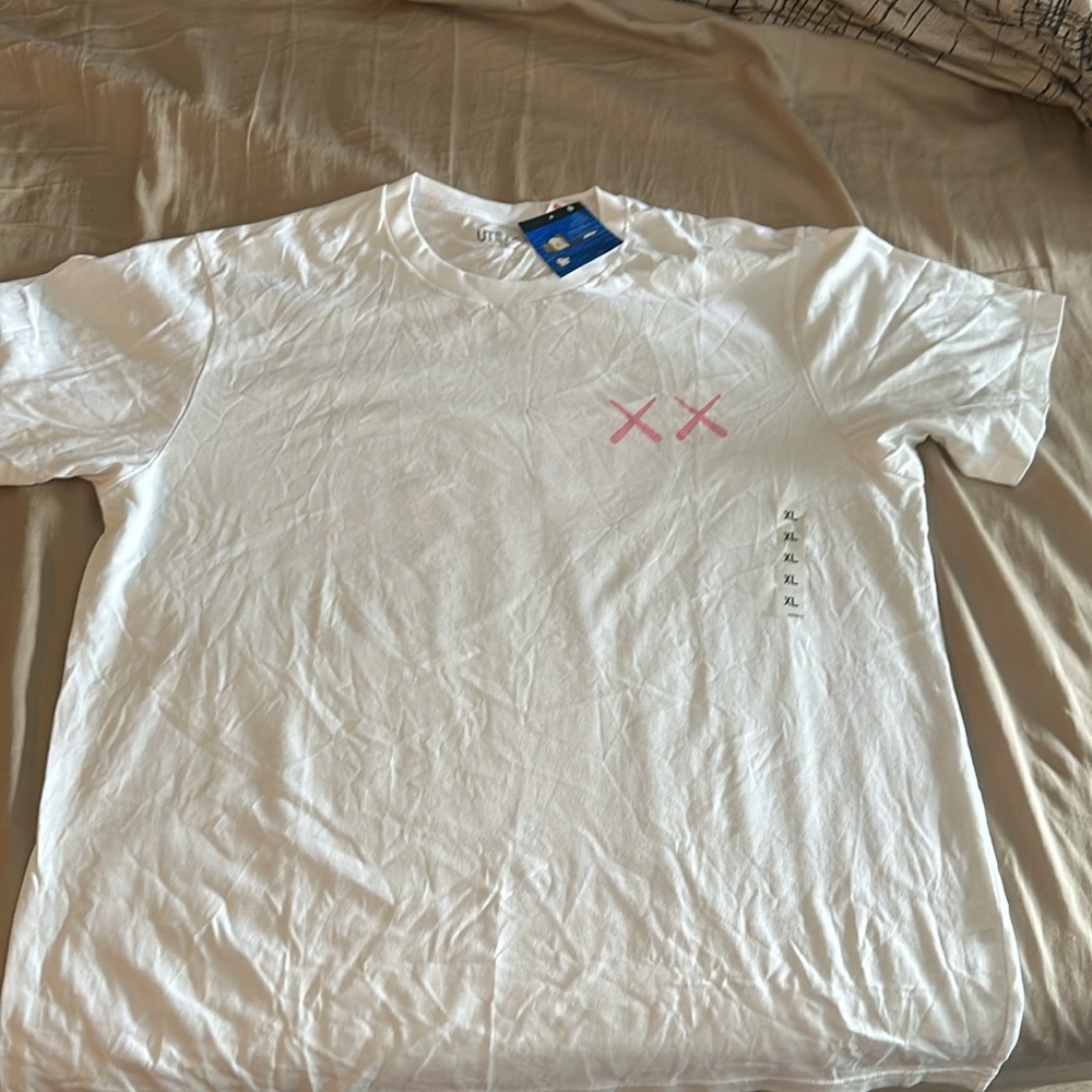 Brand new Kaws t-shirt with tags. XL Deadstock.